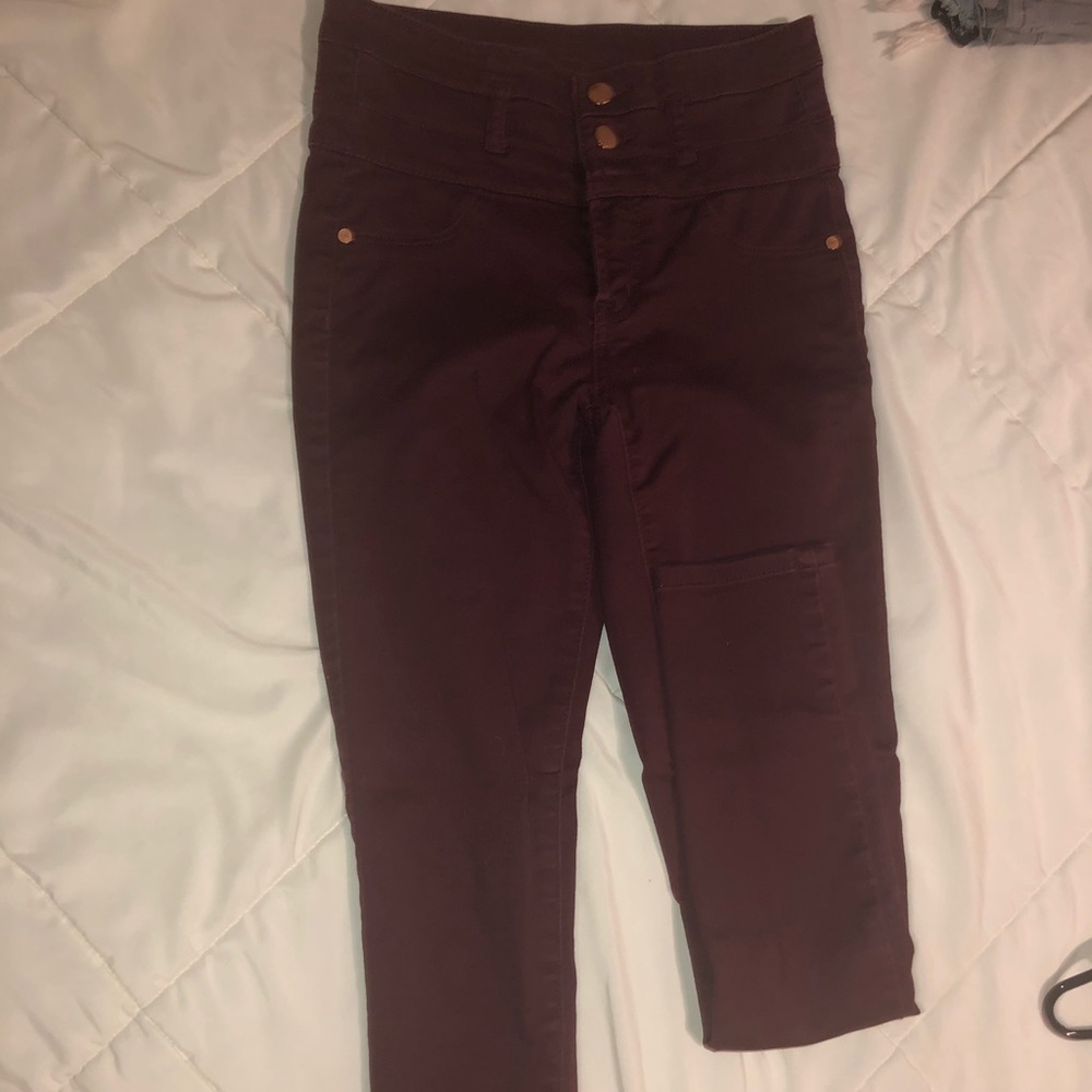 Maroon pants.